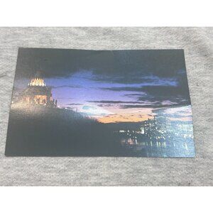 The Library of Parliament Rises Over the Ottawa River Parliament of Canada Postc